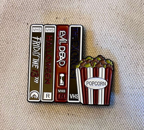 Movie Night Needle Minder horror VHS tapes and movie popcorn