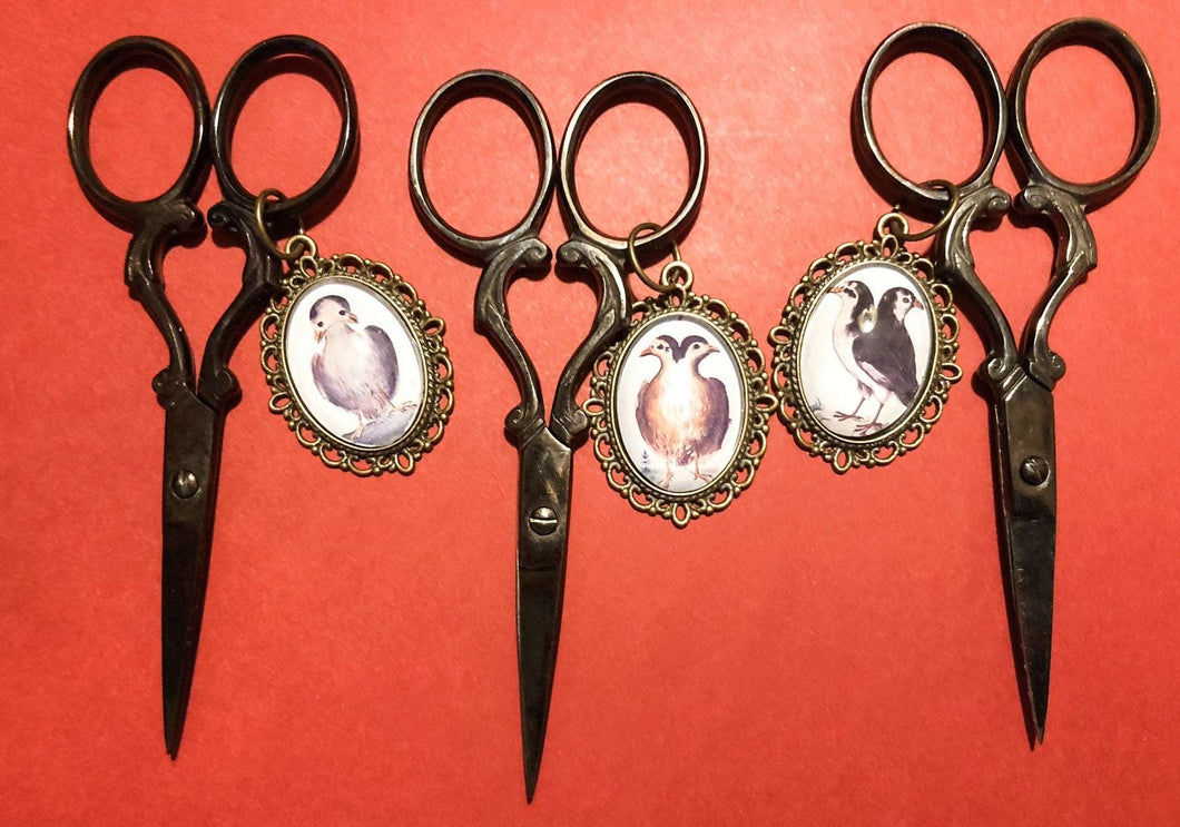 Embroidery scissors with numerous kinds of spooky fobs